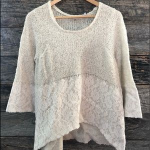 Oversized white sweater with lace details